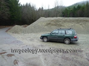 The pile of crushed dunite beside the Mosquito Lake Road.